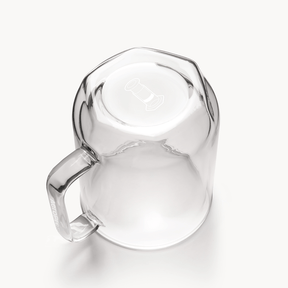 Clear glass mug on a white background
