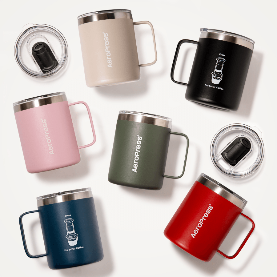 Collection of AeroPress insulated mugs in various colors on a white background #color_green