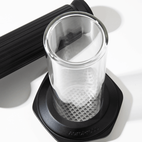 Glass AeroPress Premium coffee maker chamber on a white background #color_black
